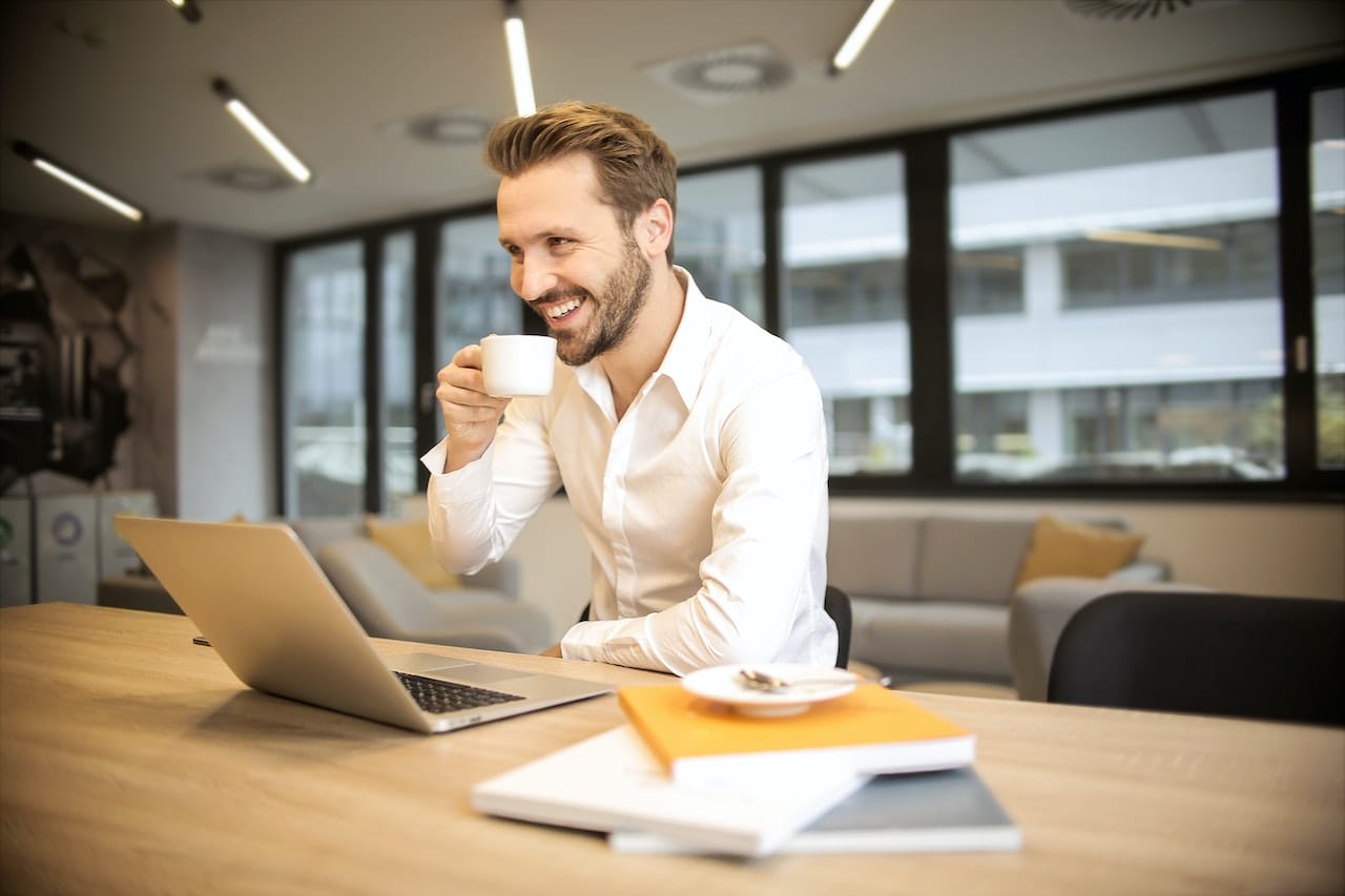 man looking at laptop